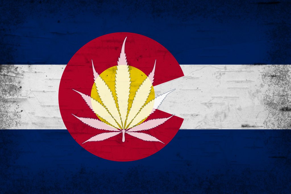 Colorado cannabis leaf state flag with a textured grunge effect